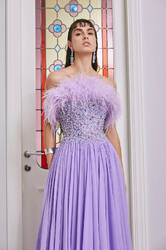 Built in corseted dress featuring Swarovski crystals and feather details Knitted unclassified dresses